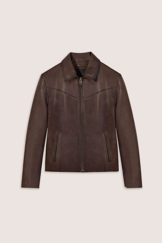 Brown leather jacket on a light beige background
