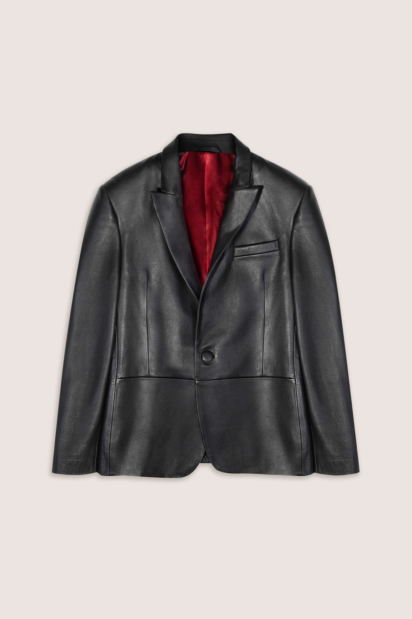 Black leather jacket blazer with red lining on a light beige background
